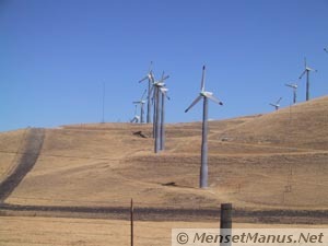 Large turbines with cylindrical towers and fire breaks