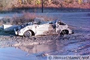 Junk Car in Mud Near TVA Wind Power Plant