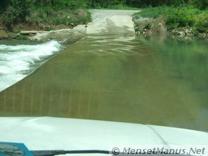 Water over bridge